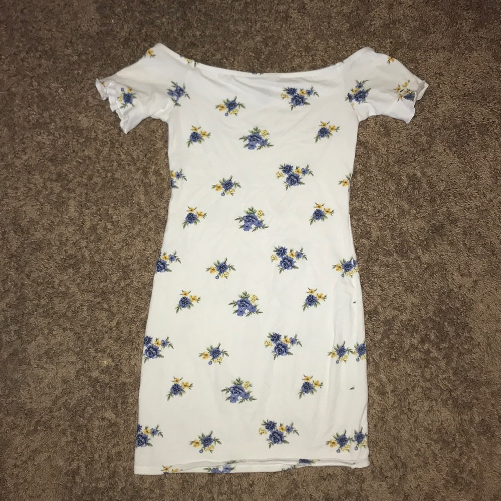 White skin tight dress with blue flowers